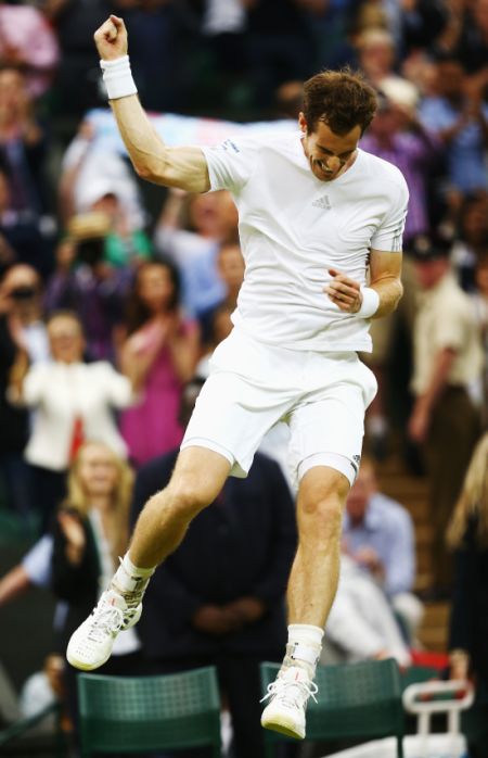 Andy Murray of Great Britain celebrates after winning his Gentlemen's Singles fourth round match against Kevin Anderson of South Africa 