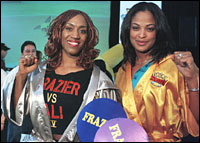 Boxers Laila Ali (R) and Jacqui Frazier