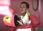 Schumacher looks at his timings after practice