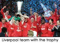 Liverpool team with the trophy