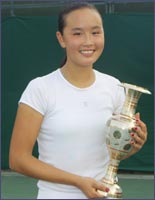 Shuai Peng with the winner's trophy