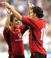 Gary Neville with Ruud Van Nistelrooy