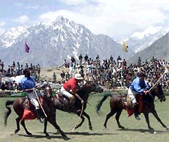 Players from the northern Pakistani mountain towns of Gilgit and Chitral play their annual polo match