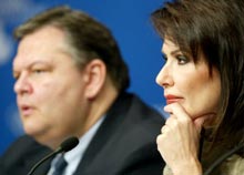 Greek Minister of Culture Evangelos Venizelos (L) and the President of the Athens 2004 Organizing Committee, Gianna Angelopoulos