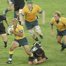 New Zealand's Keven Mealamu tackles Aussie captain George Gregan