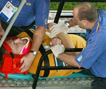 Wallaby prop Ben Darwin being stretchered off with his neck in a brace