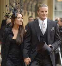 David Beckham (right) with his wife Victoria