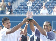 Mahesh Bhupathi (left) and Leander Paes with the ATP Masters trophy