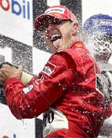 Michael Schumacher celebrates his victory of the German Grand Prix