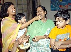 Rajyavardhan's wife (left) with her kids and his mother