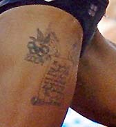 Tattoo on Joanna Hayes's right thigh