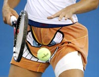 Luxembourg's Anne Kremer prepares to serve during practice for the Olympic tennis tournament in Athens, August 12, 2004.