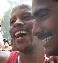 Hendrik Ramaala (left) celebrates his victory