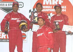 Sachin Tendulkar with the winners (From left: Ashok Jadhav, Deepak Chinnappa and Ameya Walavalkar)