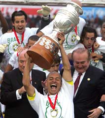 Brazil captain Alex raises the Copa America cup