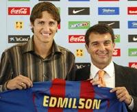 Edmilson (left) with Barcelona president Joan Laporta