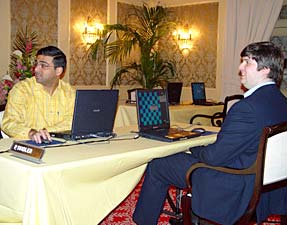 Viswanathan Anand (left) in action against Peter Svidler of Russia in the first round of the Amber Blindfold and Rapid chess tournament
