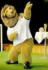 The official mascot of the 2006 World Cup, 'Goleo VI', dances during a presentation at a news conference in Leipzig on Saturday