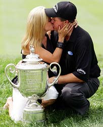 Phil Mickelson kisses his wife, Amy, after winning the 2005 PGA Championship