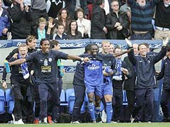 Chelsea players celebrate after winning the English Premier League