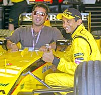 Sachin Tendulkar seated in the Jordan Formula One car of Narain Karthikeyan