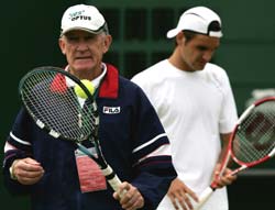 Tony Roche (left) with Roger Federer during 2005 Wimbledon