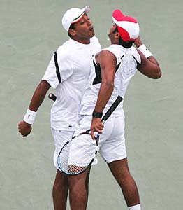 Paes and Bhupathi in a chest bump