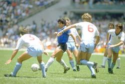 Diego Maradona takes on England during the World Cup quarter-final at the Azteca Stadium in Mexico City on June 22, 1986.