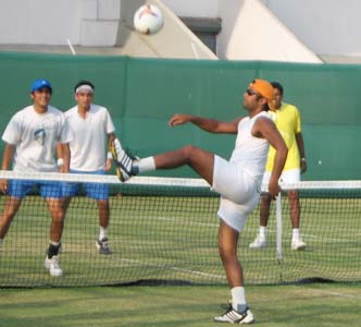 Leander Paes playing football with team
