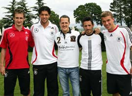 Michael Schumacher (centre) with the German national football team