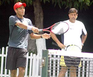 Karan Rastogi with coach Nandan Bal