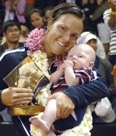 Lindsay Davenport, with son Jagger, after winning the Bali title