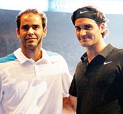 Roger Federer (right) with Pete Sampras