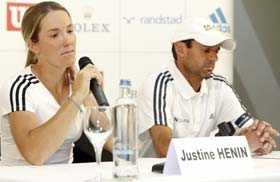 Justine henin with coach Carlos Rodriguez