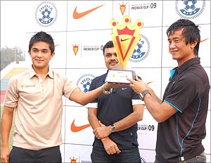 Sanjoy Gangopadhyay, marketing director of Nike, is flanked by Chhetri (left) and Bhutia