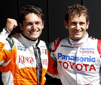 Fisichella (left) with Jarno Trulli