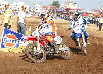 Fabio Chindhy (left)  and Vineeth Kurup negotiate a bend in the Private Expert Class