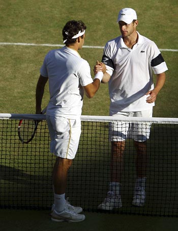 Andy Roddick with Roger Federer