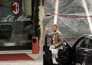 Beckham arrives at the Milanello training center in Carnago