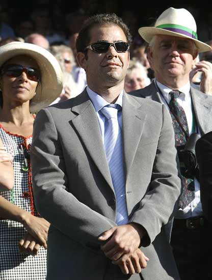 Seven-times Wimbledon champion Pete Sampras watches the presentation after the singles final