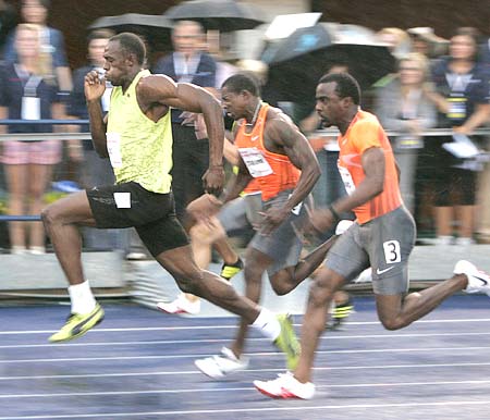 Jamaica's Usain Bolt (left) Shawn Crawford (centre) and Ivory Williams (right) of the US