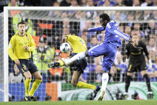 Chelsea's Michael Essien (right) scores the opening goal against Barcelona