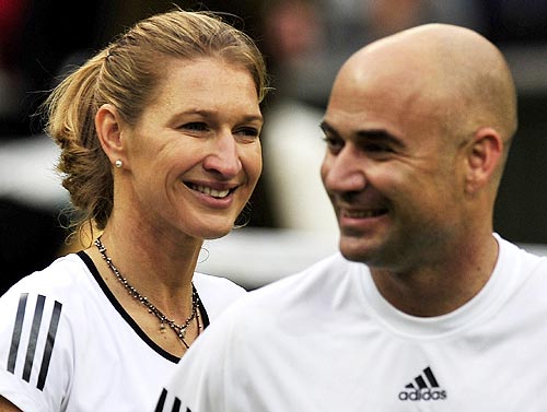 Steffi Graf and husband Andre Agassi smile