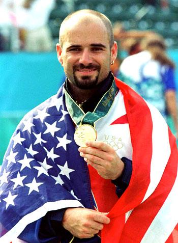 Agassi with his Olympics Gold  medal in 1996