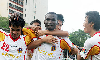 Yakubu is congratulated by his East Bengal teammates after scoring