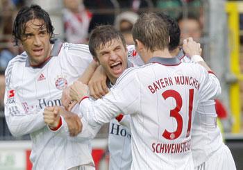 Luca Toni and Thomas Mueller