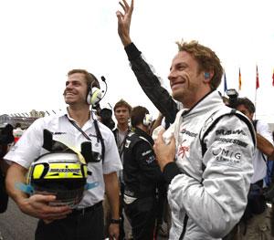 Jenson Button celebrates after winning the 2009 FI championship