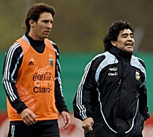 Messi and Maradona in training