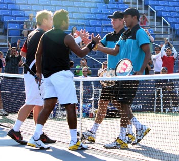 Bhupathi and Knowles congratulating Paes and Dlouhy