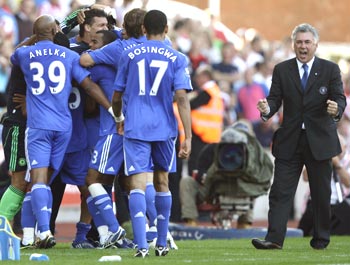 Chelsea celebrate as Ancelotti watches from the sidelines